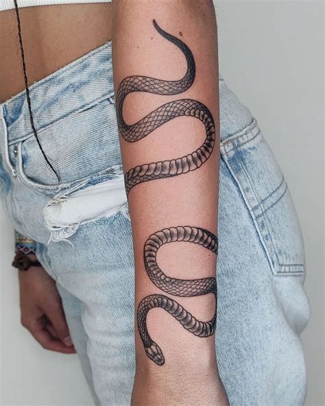 snake wrapped around arm tattoo|Wrap around snake tattoo arm